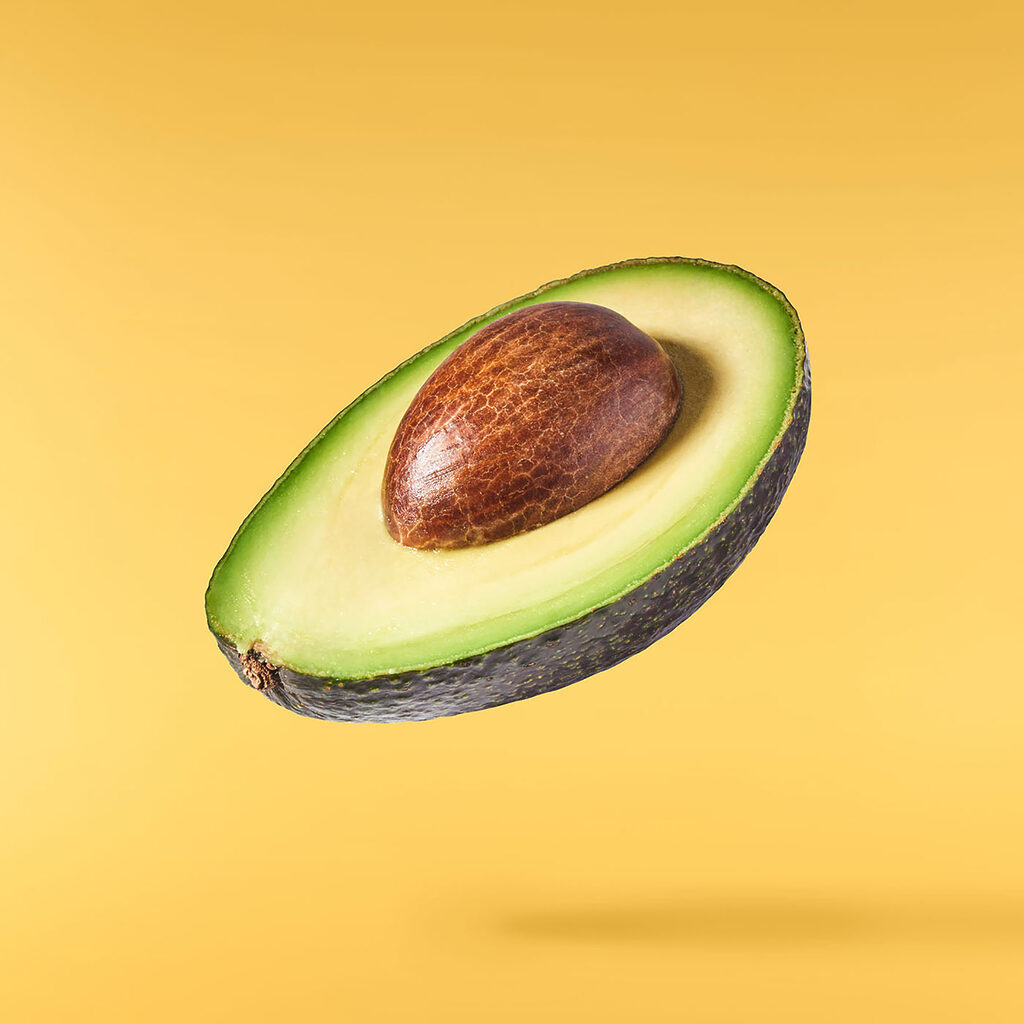 Halbierte Avocado — ganzes Design