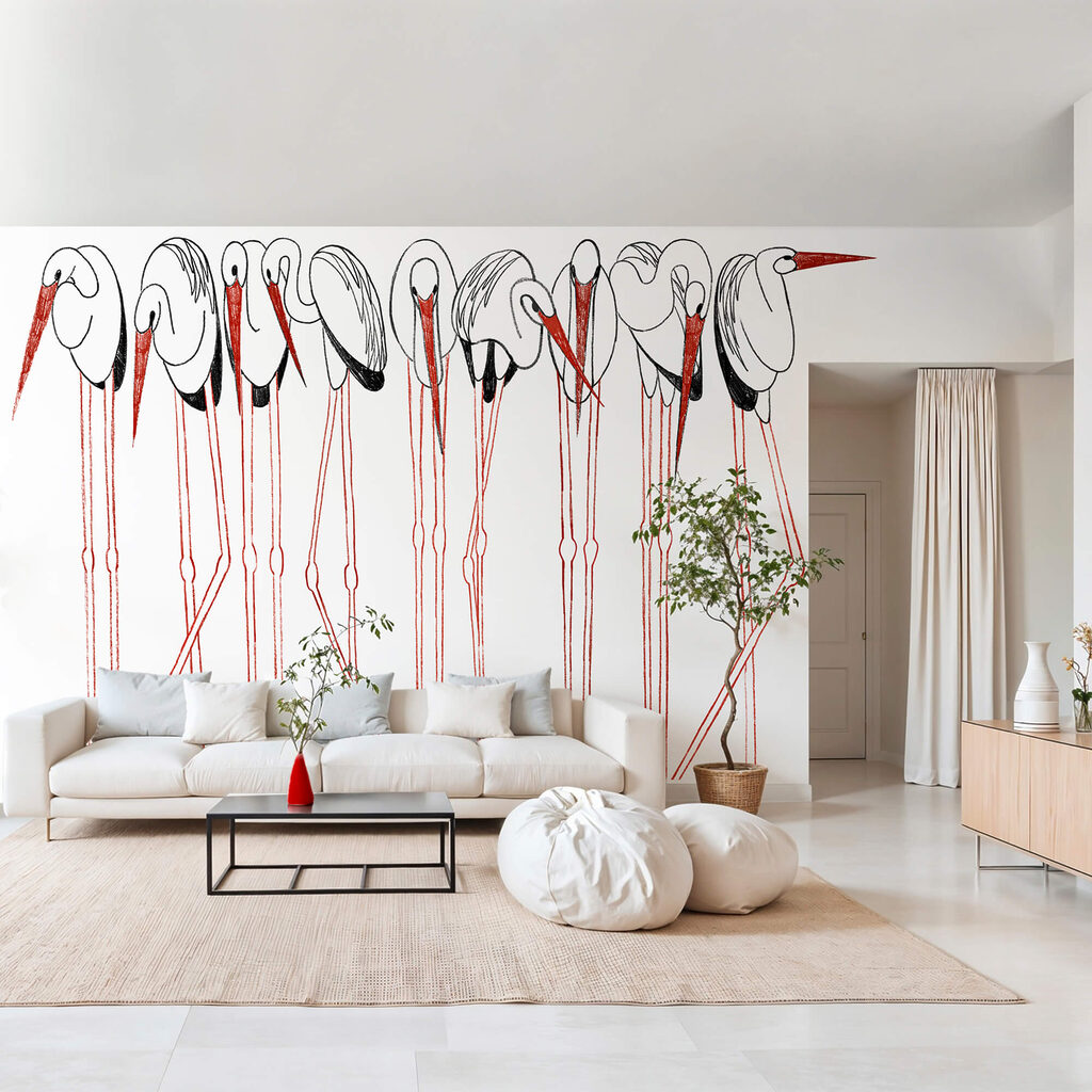 Vögel auf roten Stelzen in einem Interieur