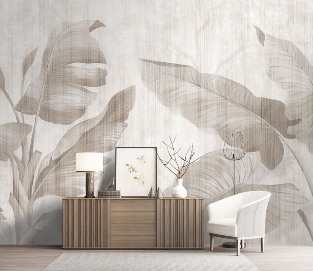 Blattschatten auf verwittertem Weiß in einem Interieur